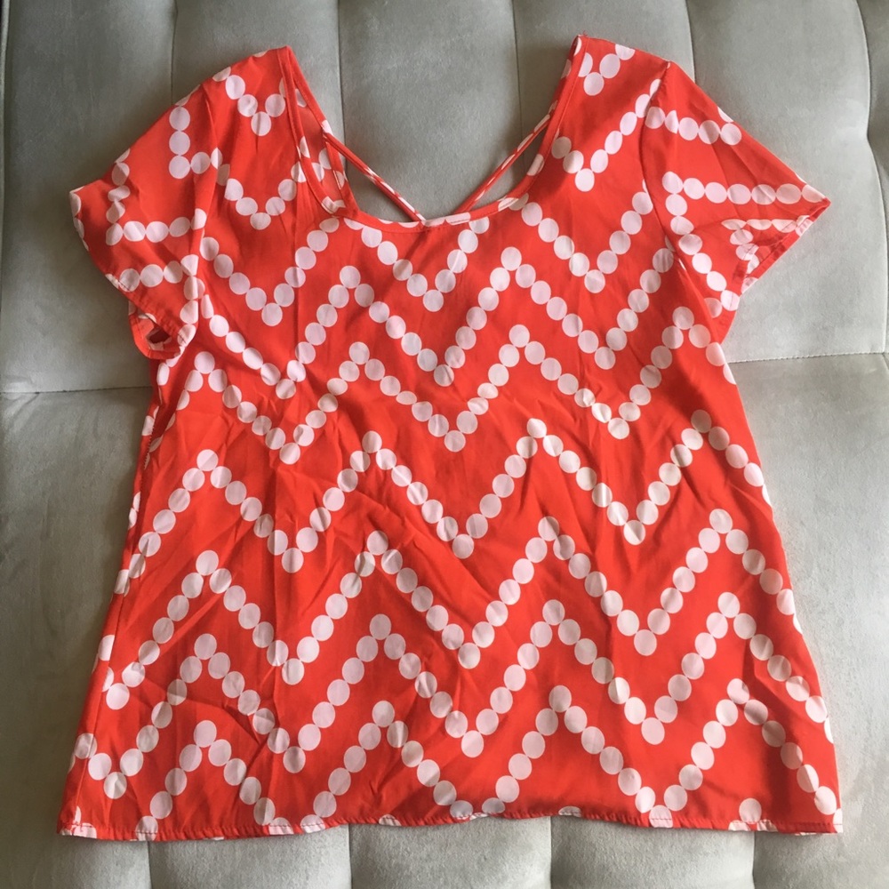 Cute orange blouse with back detailing